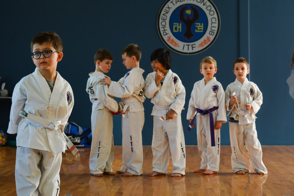 Why Martial Arts Summer Camps Are the Ultimate Confidence Boost for Kids 1 Children practicing martial arts skills at Phoenix’s kids summer camp in St. Albert and Spruce Grove, Alberta.