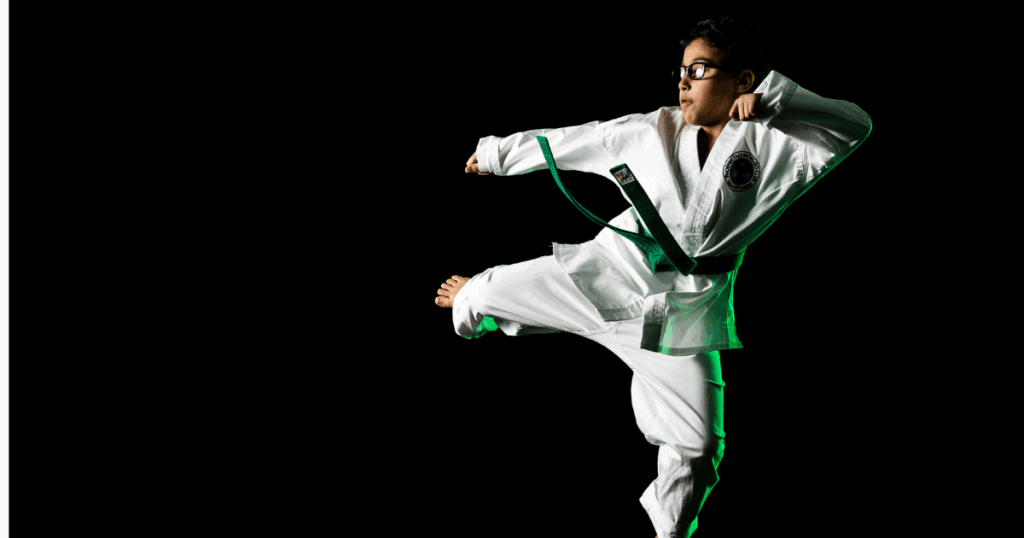 How to Help Your Child Prepare for Their First Taekwon-do Belt Test 1 phoenix martial arts belt test preparation green belt kick.png