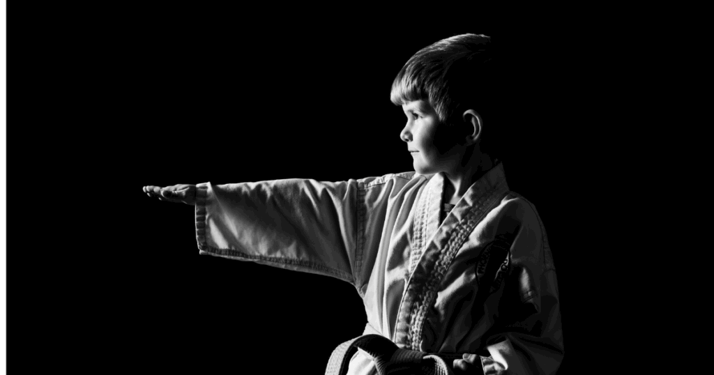 Beyond Kicks and Punches: Life Lessons Kids Learn at Phoenix Summer Camps 1 phoenix martial arts life lessons young boy taekwondo.png